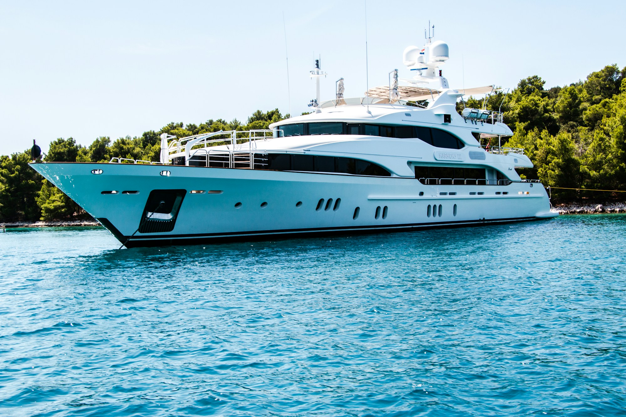 Luxury yacht on tranquil turquoise water
